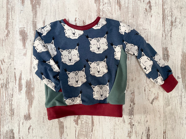 Sweater mit Tasche - Luchse Gr. 80-98